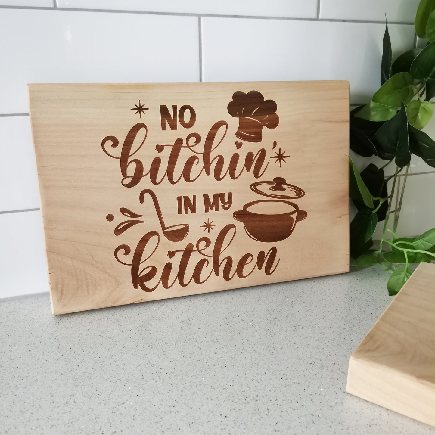 "No Bitchin' in my Kitchen" Bread Board - Macrocarpa